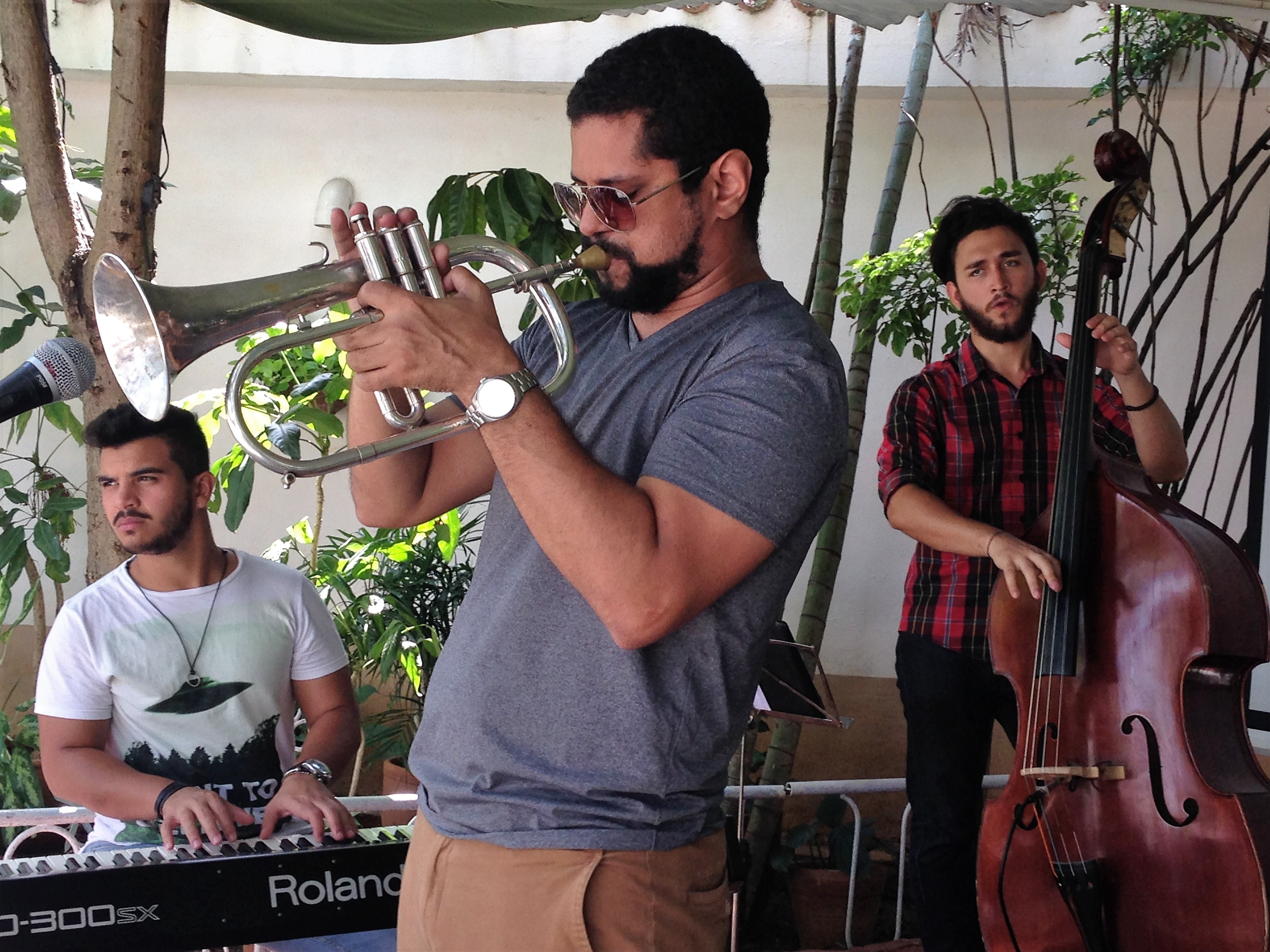 Cuban jazz group performing on outdoor patio