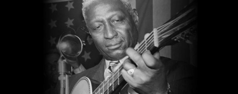 Leadbelly with guitar for blues ukulele lesson